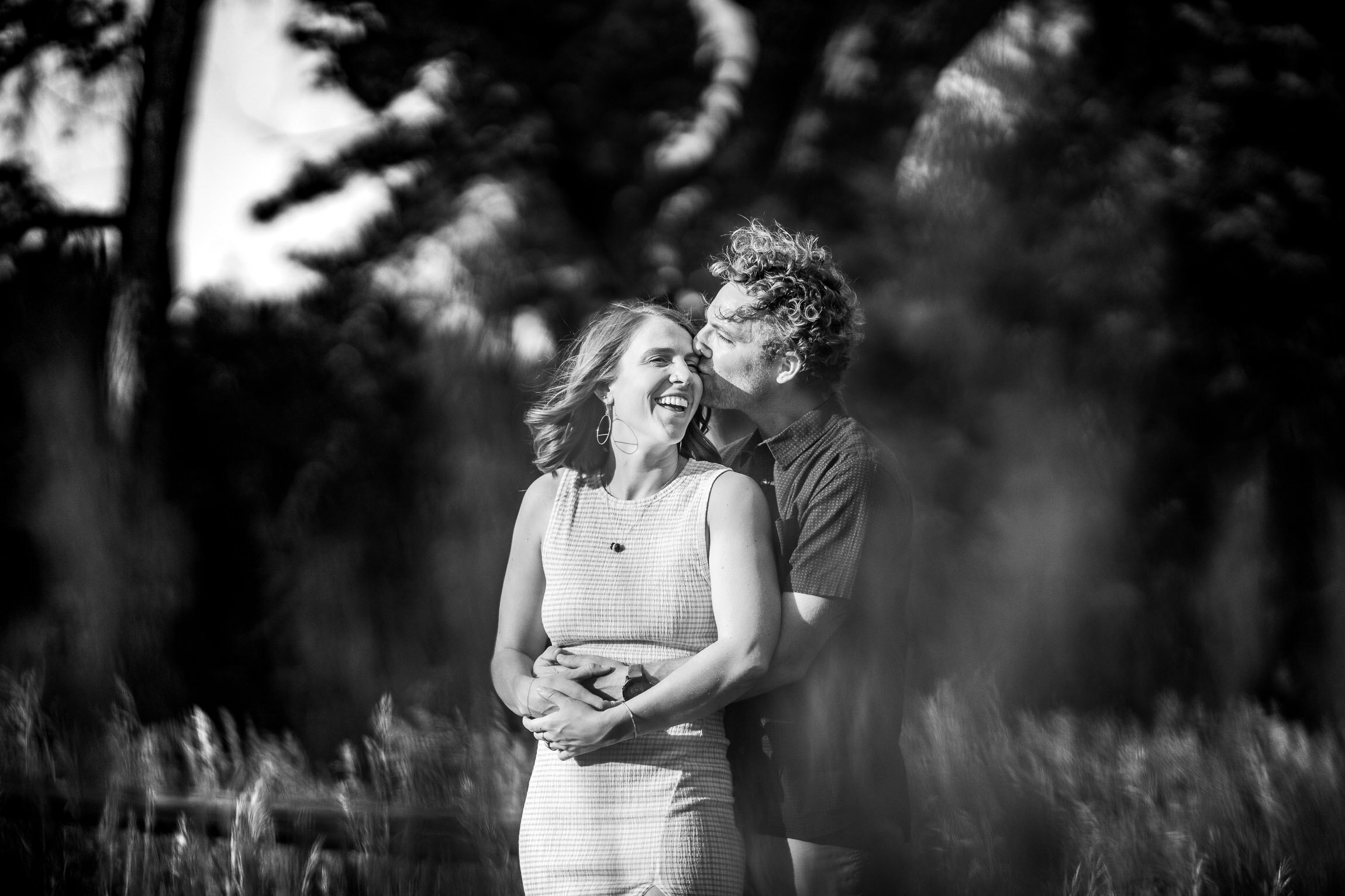 Engaged couple walks while holding hands in the tall windswept grass during golden hour, Engagement Session, Engagement Photos, Engagement Photos Inspiration, Engagement Photography, Engagement Photographer, Winter Engagement Photos, Mountain Engagement Photos, Denver engagement session, Denver engagement photos, Denver engagement photography, Denver engagement photographer, Denver engagement inspiration, Colorado engagement session, Colorado engagement photos, Colorado engagement photography, Colorado engagement photographer, Colorado engagement inspiration