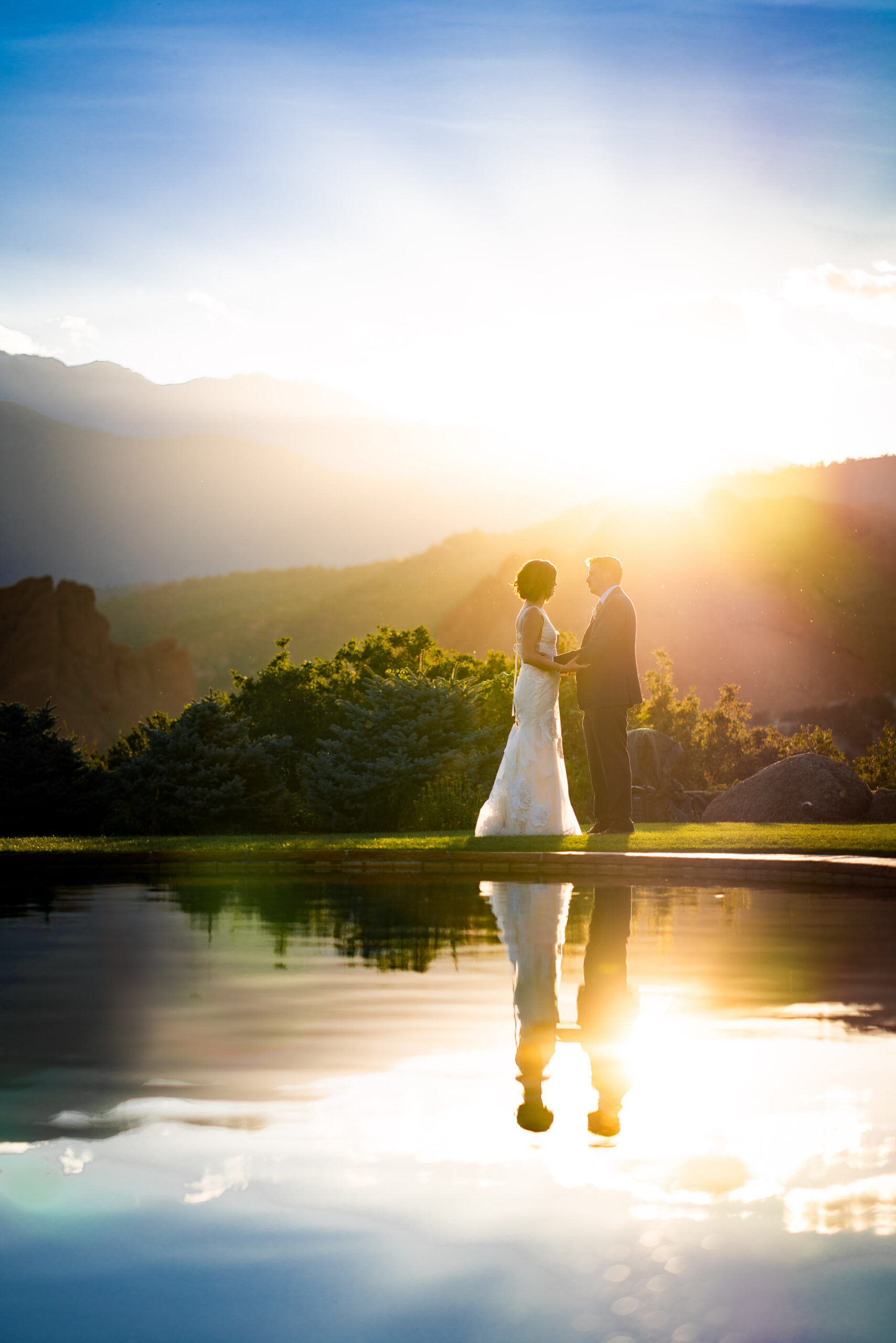 Bride and groom portraits at the Garden of the Gods Club and resort by the reflection pond, wedding photos, wedding photography, wedding photographer, wedding inspiration, wedding photo inspiration, wedding portraits, wedding ceremony, wedding reception, mountain wedding, Garden of the Gods wedding, Garden of the Gods Club & Resort wedding, Garden of the Gods Club & Resort wedding photos, Garden of the Gods Club & Resort wedding photography, Garden of the Gods Club & Resort wedding photographer, Garden of the Gods Club & Resort wedding inspiration, Garden of the Gods Club & Resort wedding venue, Colorado Springs wedding, Colorado Springs wedding photos,  Colorado Springs wedding photography, Colorado Springs wedding photographer, Colorado wedding, Colorado wedding photos, Colorado wedding photography, Colorado wedding photographer, Colorado mountain wedding, Colorado wedding inspiration