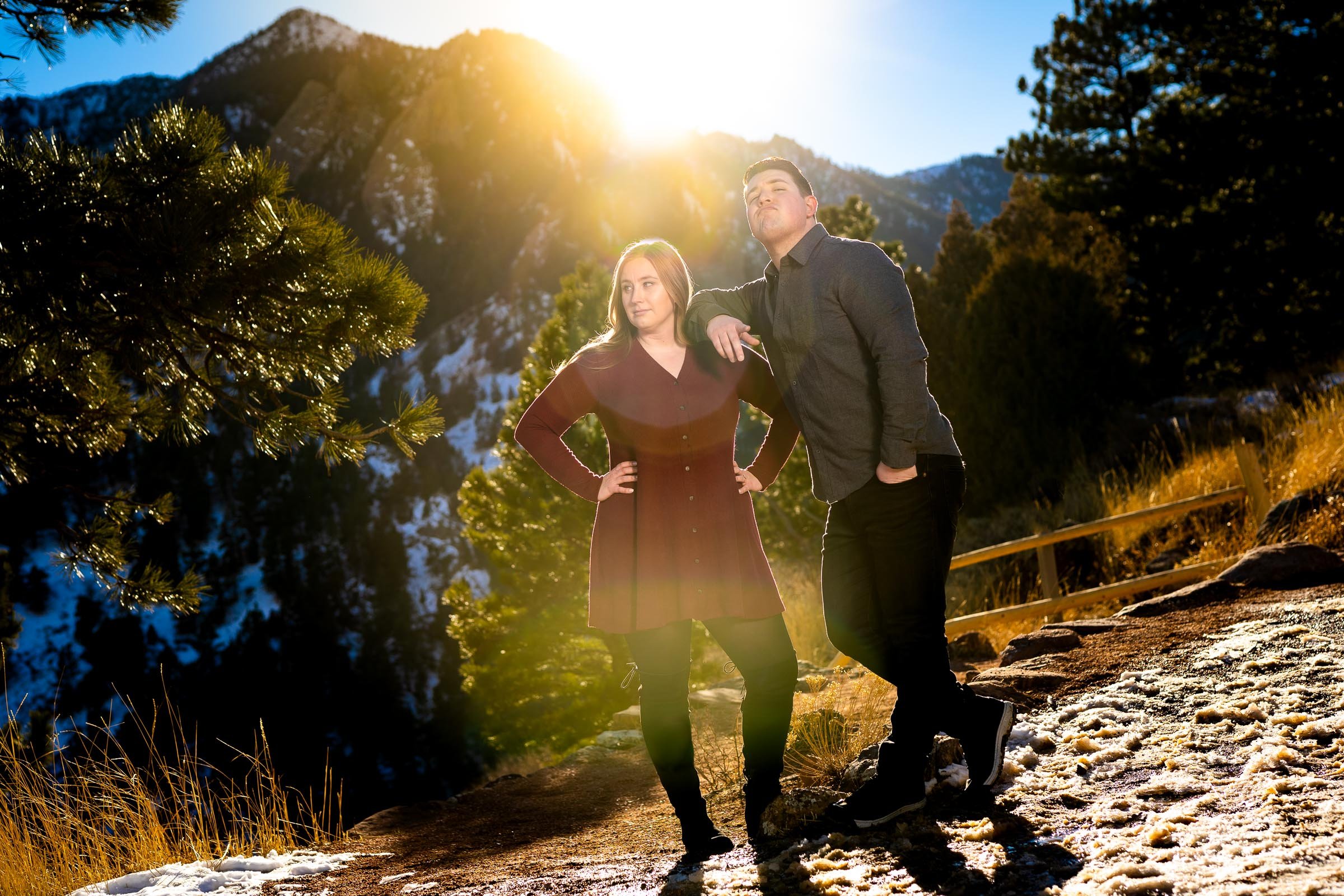 Engaged couple poses for portraits with the flatirons mountains in the background, Mountain Engagement Photos, Engagement Session, Engagement Photos, Engagement Photos Inspiration, Engagement Photography, Engagement Photographer, Engagement Portraits, Winter Engagement Photos, Snow Engagement Photos, Boulder engagement session, Boulder engagement photos, Boulder engagement photography, Boulder engagement photographer, Boulder engagement inspiration, NCAR Trail engagement session, NCAR Trail engagement photos, NCAR Trail engagement photography, NCAR Trail engagement photographer, NCAR Trail engagement inspiration, Colorado engagement session, Colorado engagement photos, Colorado engagement photography, Colorado engagement photographer, Colorado engagement inspiration, Flatiron Engagement Photos, Chautauqua Engagement Photos