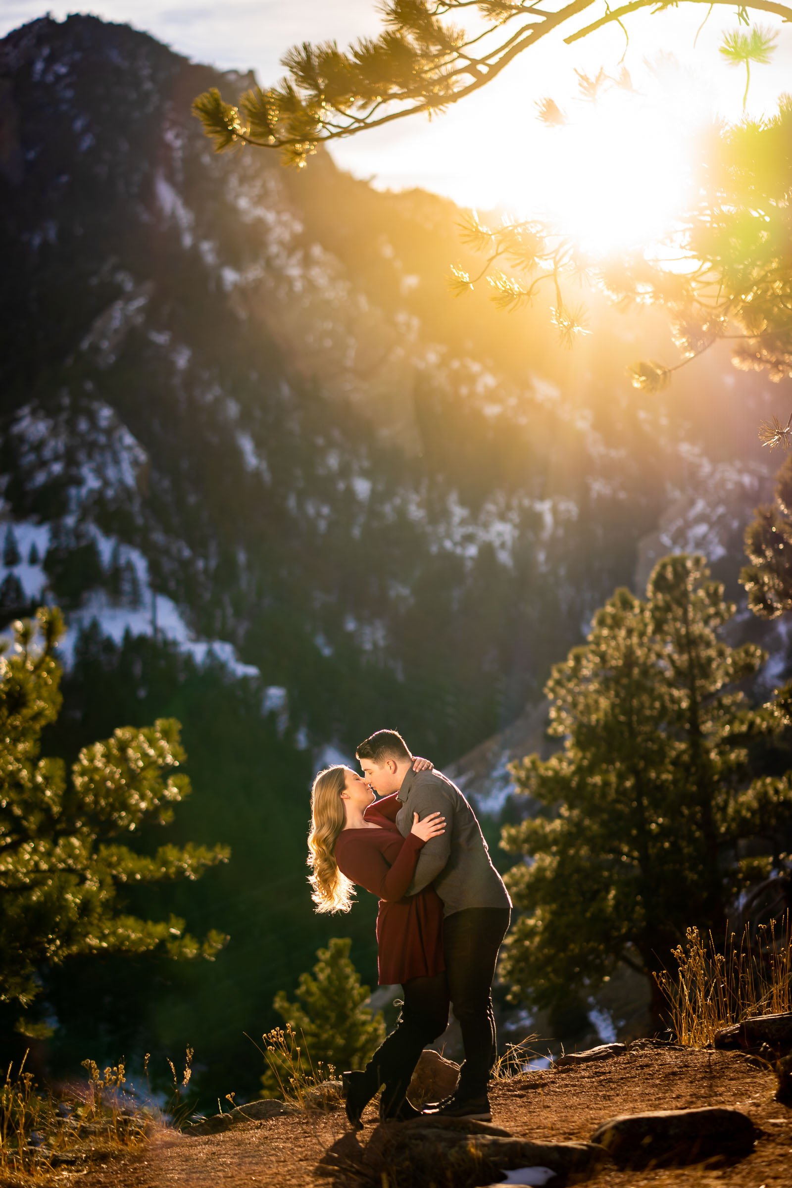 Engaged couple poses for portraits with the flatiron mountains in the background, Mountain Engagement Photos, Engagement Session, Engagement Photos, Engagement Photos Inspiration, Engagement Photography, Engagement Photographer, Engagement Portraits, Winter Engagement Photos, Snow Engagement Photos, Boulder engagement session, Boulder engagement photos, Boulder engagement photography, Boulder engagement photographer, Boulder engagement inspiration, NCAR Trail engagement session, NCAR Trail engagement photos, NCAR Trail engagement photography, NCAR Trail engagement photographer, NCAR Trail engagement inspiration, Colorado engagement session, Colorado engagement photos, Colorado engagement photography, Colorado engagement photographer, Colorado engagement inspiration, Flatiron Engagement Photos, Chautauqua Engagement Photos