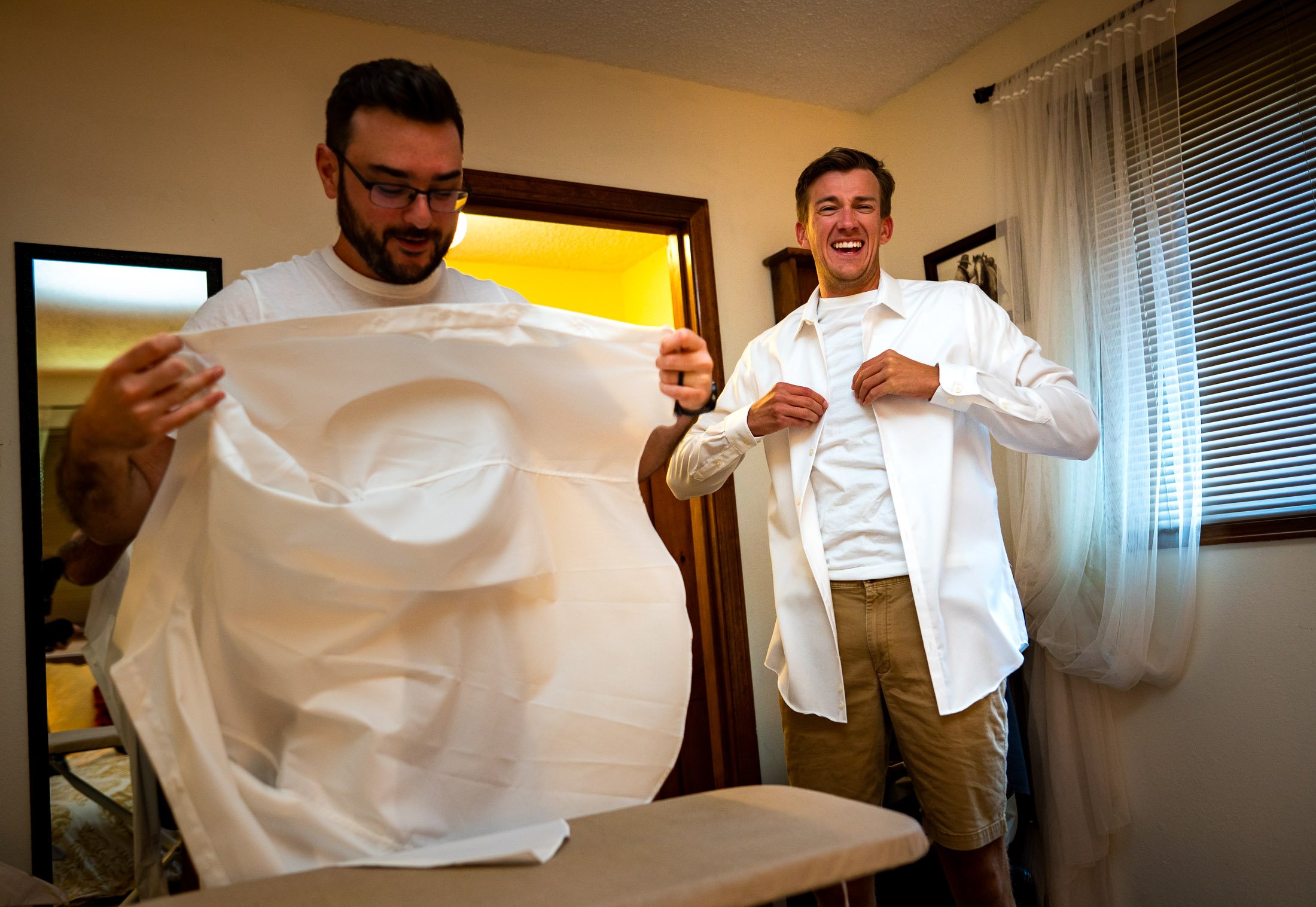 Groom gets ready with groomsmen at their Airbnb, wedding, wedding photos, wedding photography, wedding photographer, wedding inspiration, wedding photo inspiration, wedding portraits, wedding ceremony, wedding reception, mountain wedding, Catholic Church wedding, Catholic Church wedding photos, Catholic Church wedding photography, Catholic Church wedding photographer, Catholic Church wedding inspiration, Catholic Church wedding venue, Steamboat Springs wedding, Steamboat Springs wedding photos, Steamboat Springs wedding photography, Steamboat Springs wedding photographer, Colorado wedding, Colorado wedding photos, Colorado wedding photography, Colorado wedding photographer, Colorado mountain wedding, Colorado wedding inspiration