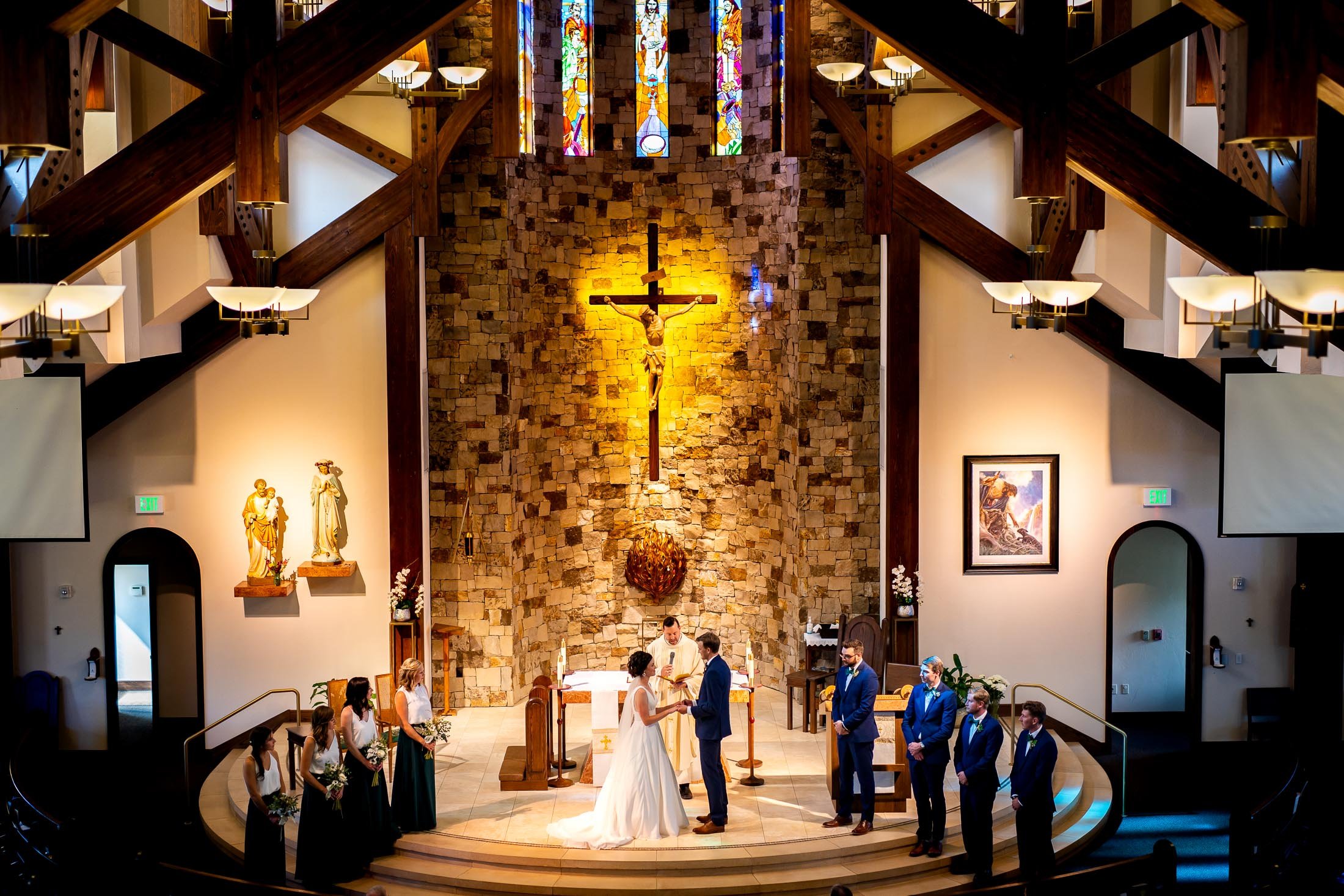 Bride and groom attend their catholic wedding ceremony at the church, wedding, wedding photos, wedding photography, wedding photographer, wedding inspiration, wedding photo inspiration, wedding portraits, wedding ceremony, wedding reception, mountain wedding, Catholic Church wedding, Catholic Church wedding photos, Catholic Church wedding photography, Catholic Church wedding photographer, Catholic Church wedding inspiration, Catholic Church wedding venue, Steamboat Springs wedding, Steamboat Springs wedding photos, Steamboat Springs wedding photography, Steamboat Springs wedding photographer, Colorado wedding, Colorado wedding photos, Colorado wedding photography, Colorado wedding photographer, Colorado mountain wedding, Colorado wedding inspiration