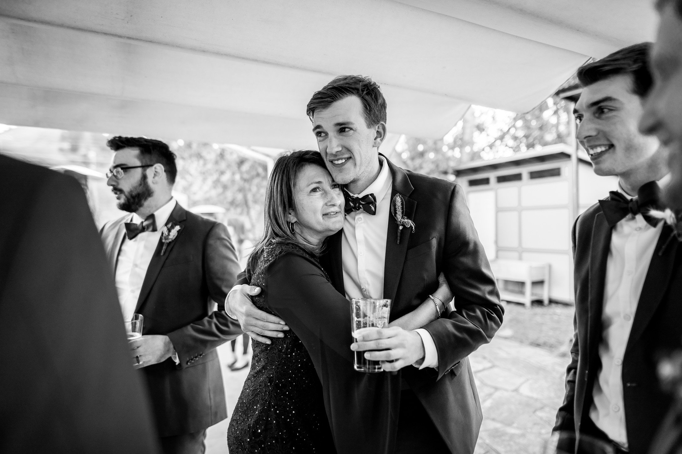 Bride and groom mingle with guests during their wedding reception, wedding, wedding photos, wedding photography, wedding photographer, wedding inspiration, wedding photo inspiration, wedding portraits, wedding ceremony, wedding reception, mountain wedding, Catholic Church wedding, Catholic Church wedding photos, Catholic Church wedding photography, Catholic Church wedding photographer, Catholic Church wedding inspiration, Catholic Church wedding venue, Steamboat Springs wedding, Steamboat Springs wedding photos, Steamboat Springs wedding photography, Steamboat Springs wedding photographer, Colorado wedding, Colorado wedding photos, Colorado wedding photography, Colorado wedding photographer, Colorado mountain wedding, Colorado wedding inspiration