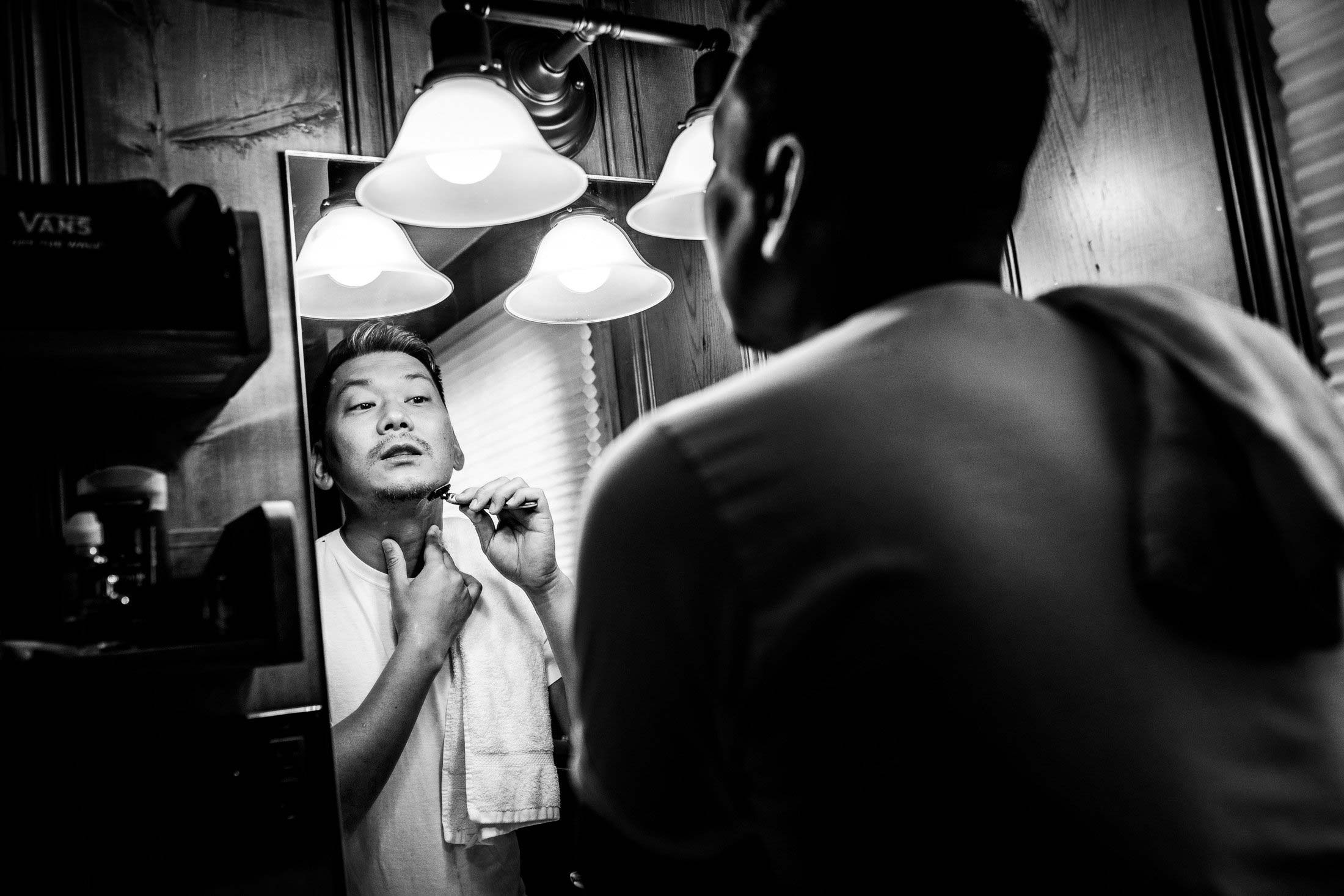 Groom gets ready in log cabin in the forest, wedding, wedding photos, wedding photography, wedding photographer, wedding inspiration, wedding photo inspiration, mountain wedding, YMCA of the Rockies wedding, YMCA of the Rockies wedding photos, YMCA of the Rockies wedding photography, YMCA of the Rockies wedding photographer, YMCA of the Rockies wedding inspiration, YMCA of the Rockies wedding venue, Estes Park wedding, Estes Park wedding photos, Estes Park wedding photography, Estes Park wedding photographer, Colorado wedding, Colorado wedding photos, Colorado wedding photography, Colorado wedding photographer, Colorado mountain wedding, Colorado wedding inspiration