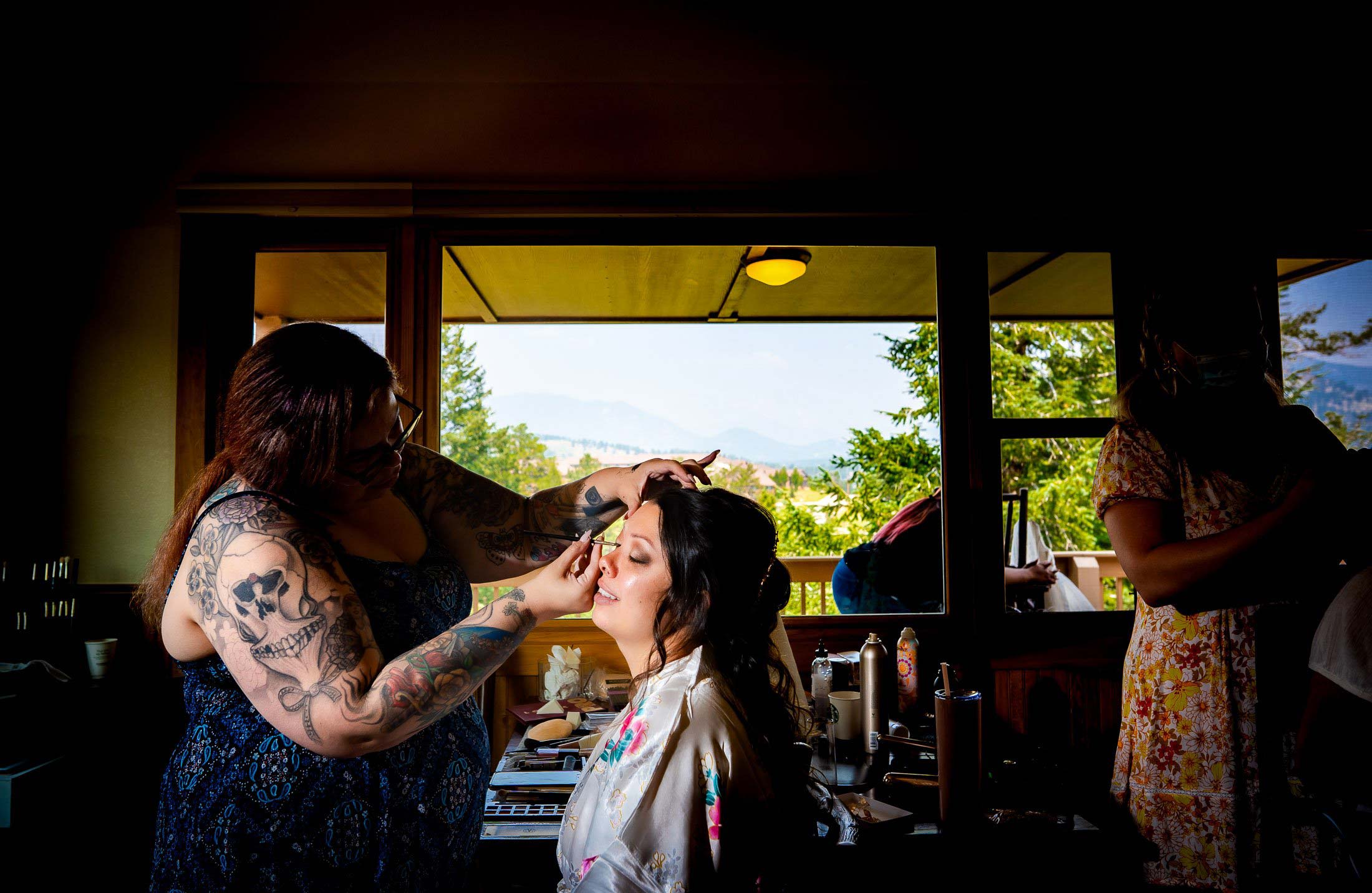 Bride has her make-up done in the bridal suite, wedding, wedding photos, wedding photography, wedding photographer, wedding inspiration, wedding photo inspiration, mountain wedding, YMCA of the Rockies wedding, YMCA of the Rockies wedding photos, YMCA of the Rockies wedding photography, YMCA of the Rockies wedding photographer, YMCA of the Rockies wedding inspiration, YMCA of the Rockies wedding venue, Estes Park wedding, Estes Park wedding photos, Estes Park wedding photography, Estes Park wedding photographer, Colorado wedding, Colorado wedding photos, Colorado wedding photography, Colorado wedding photographer, Colorado mountain wedding, Colorado wedding inspiration