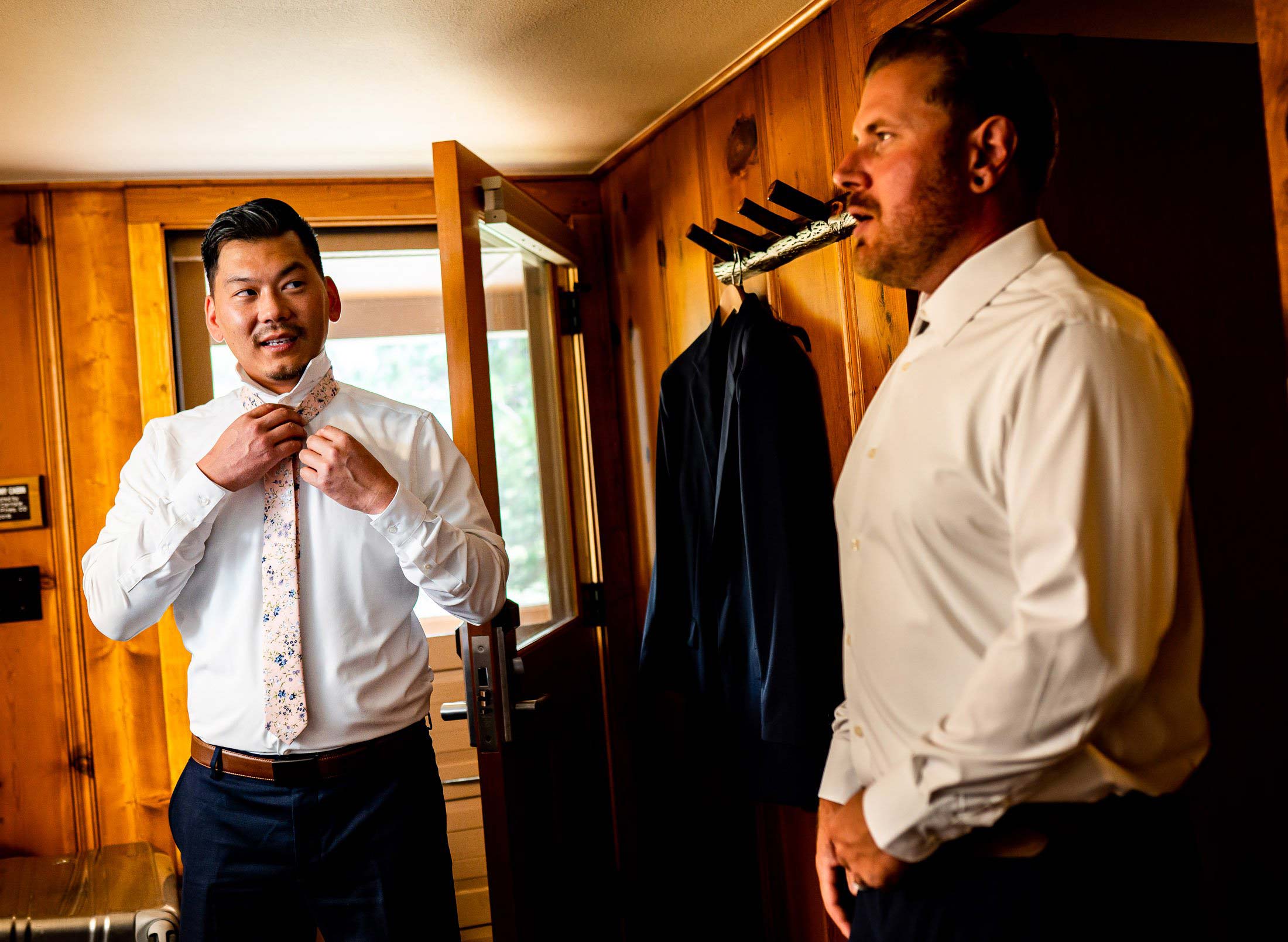 Groom gets ready in log cabin in the forest, wedding, wedding photos, wedding photography, wedding photographer, wedding inspiration, wedding photo inspiration, mountain wedding, YMCA of the Rockies wedding, YMCA of the Rockies wedding photos, YMCA of the Rockies wedding photography, YMCA of the Rockies wedding photographer, YMCA of the Rockies wedding inspiration, YMCA of the Rockies wedding venue, Estes Park wedding, Estes Park wedding photos, Estes Park wedding photography, Estes Park wedding photographer, Colorado wedding, Colorado wedding photos, Colorado wedding photography, Colorado wedding photographer, Colorado mountain wedding, Colorado wedding inspiration