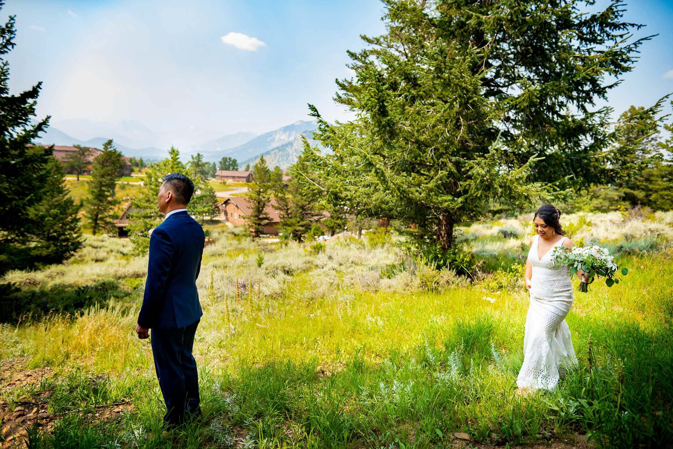 Bride and groom share an emotional first look in the forest outside their cabin in Rocky Mountain National Park, wedding, wedding photos, wedding photography, wedding photographer, wedding inspiration, wedding photo inspiration, mountain wedding, YMCA of the Rockies wedding, YMCA of the Rockies wedding photos, YMCA of the Rockies wedding photography, YMCA of the Rockies wedding photographer, YMCA of the Rockies wedding inspiration, YMCA of the Rockies wedding venue, Estes Park wedding, Estes Park wedding photos, Estes Park wedding photography, Estes Park wedding photographer, Colorado wedding, Colorado wedding photos, Colorado wedding photography, Colorado wedding photographer, Colorado mountain wedding, Colorado wedding inspiration