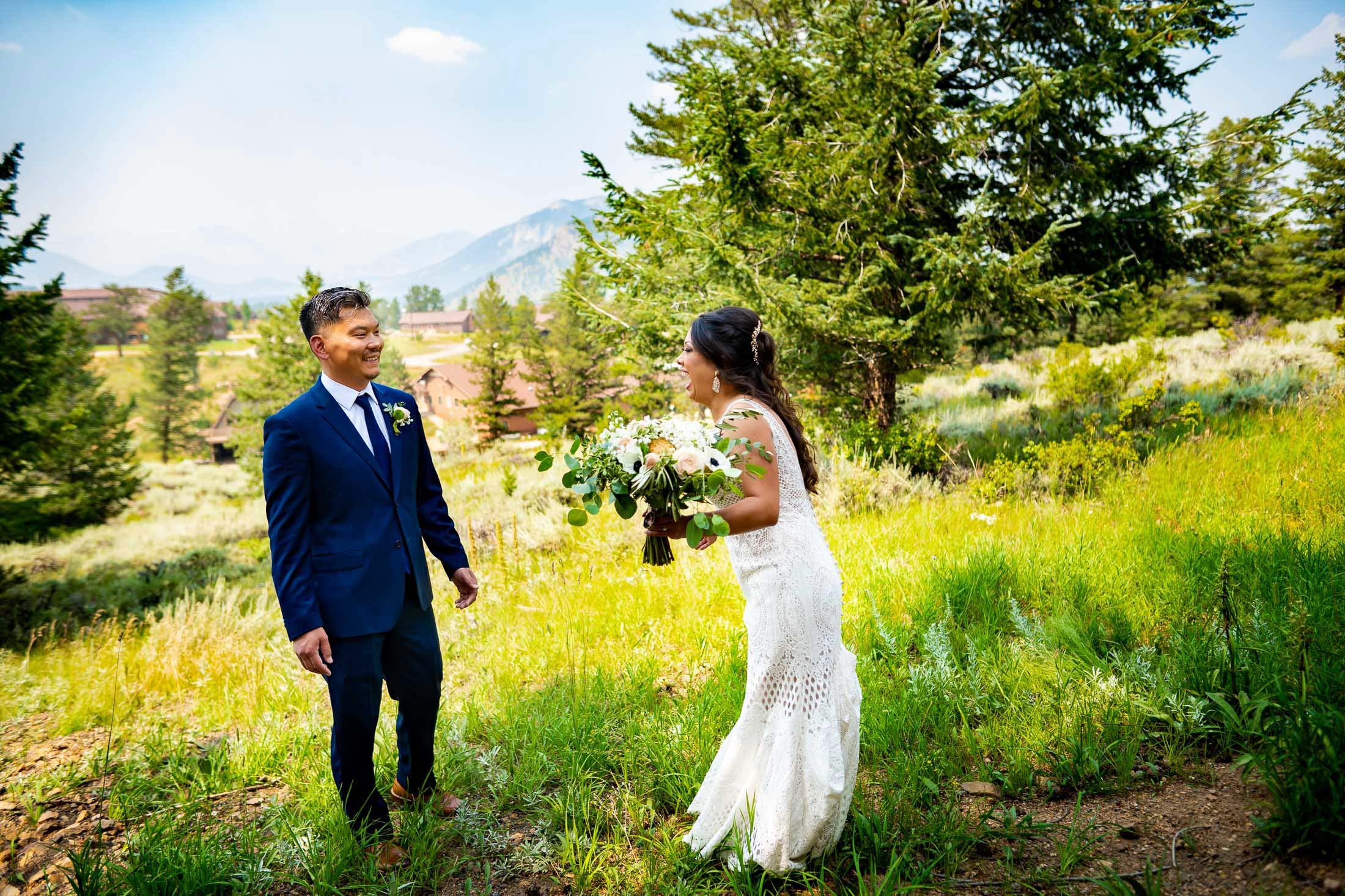 Bride and groom share an emotional first look in the forest outside their cabin in Rocky Mountain National Park, wedding, wedding photos, wedding photography, wedding photographer, wedding inspiration, wedding photo inspiration, mountain wedding, YMCA of the Rockies wedding, YMCA of the Rockies wedding photos, YMCA of the Rockies wedding photography, YMCA of the Rockies wedding photographer, YMCA of the Rockies wedding inspiration, YMCA of the Rockies wedding venue, Estes Park wedding, Estes Park wedding photos, Estes Park wedding photography, Estes Park wedding photographer, Colorado wedding, Colorado wedding photos, Colorado wedding photography, Colorado wedding photographer, Colorado mountain wedding, Colorado wedding inspiration