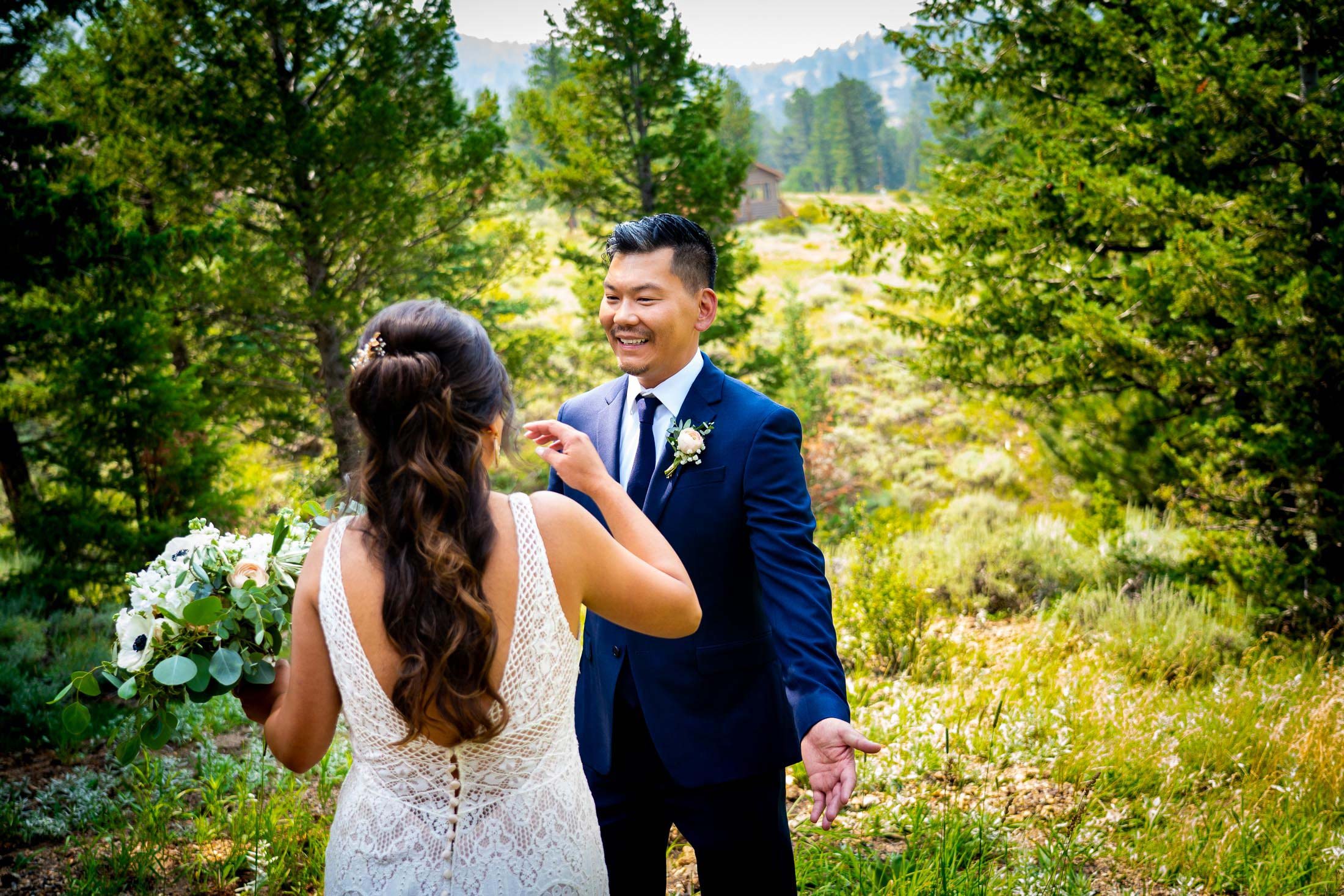 Bride and groom share an emotional first look in the forest outside their cabin in Rocky Mountain National Park, wedding, wedding photos, wedding photography, wedding photographer, wedding inspiration, wedding photo inspiration, mountain wedding, YMCA of the Rockies wedding, YMCA of the Rockies wedding photos, YMCA of the Rockies wedding photography, YMCA of the Rockies wedding photographer, YMCA of the Rockies wedding inspiration, YMCA of the Rockies wedding venue, Estes Park wedding, Estes Park wedding photos, Estes Park wedding photography, Estes Park wedding photographer, Colorado wedding, Colorado wedding photos, Colorado wedding photography, Colorado wedding photographer, Colorado mountain wedding, Colorado wedding inspiration