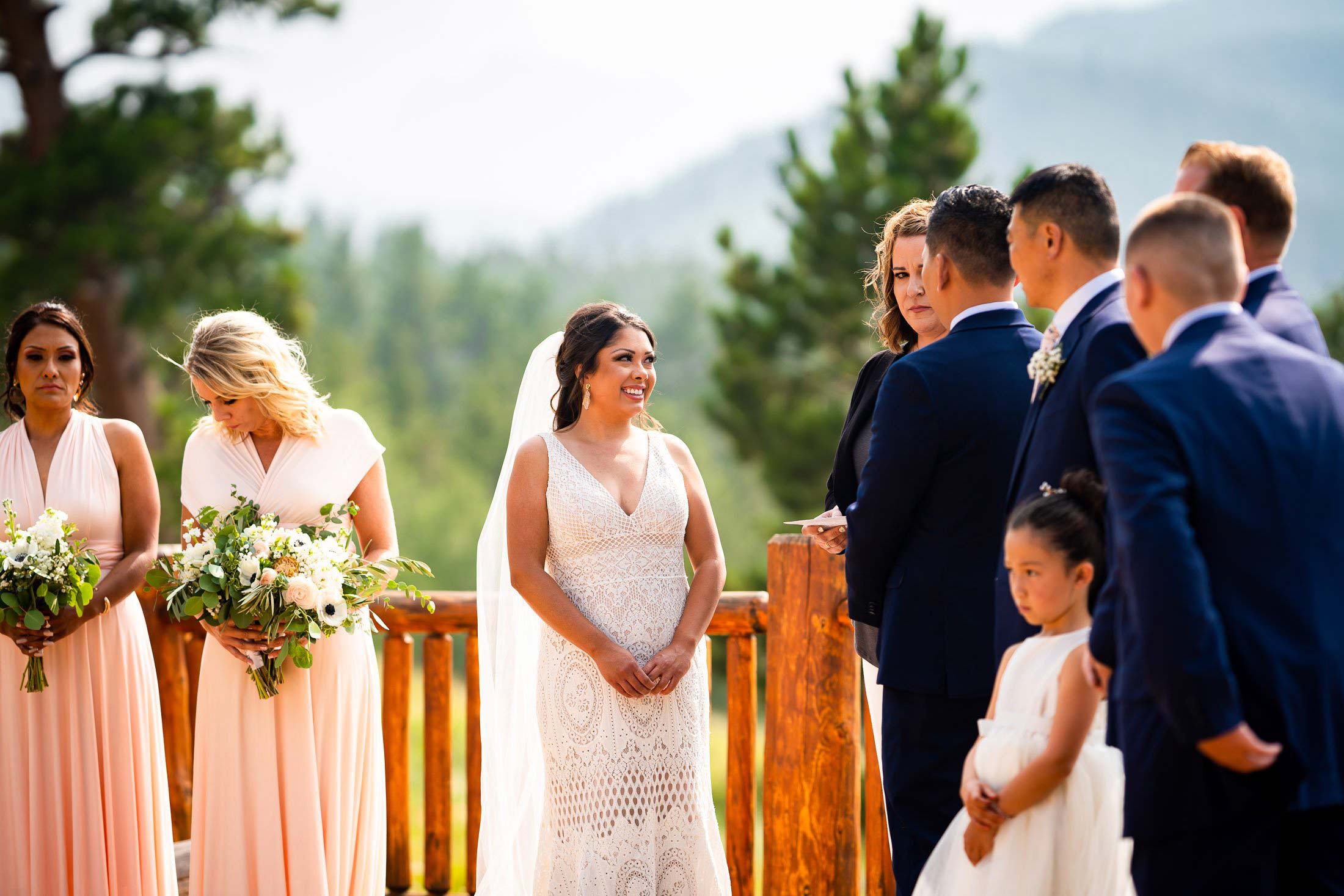 Bride and groom attend their wedding ceremony in the mountains, wedding photos, wedding photography, wedding photographer, wedding inspiration, wedding photo inspiration, mountain wedding, YMCA of the Rockies wedding, YMCA of the Rockies wedding photos, YMCA of the Rockies wedding photography, YMCA of the Rockies wedding photographer, YMCA of the Rockies wedding inspiration, YMCA of the Rockies wedding venue, Estes Park wedding, Estes Park wedding photos, Estes Park wedding photography, Estes Park wedding photographer, Colorado wedding, Colorado wedding photos, Colorado wedding photography, Colorado wedding photographer, Colorado mountain wedding, Colorado wedding inspiration