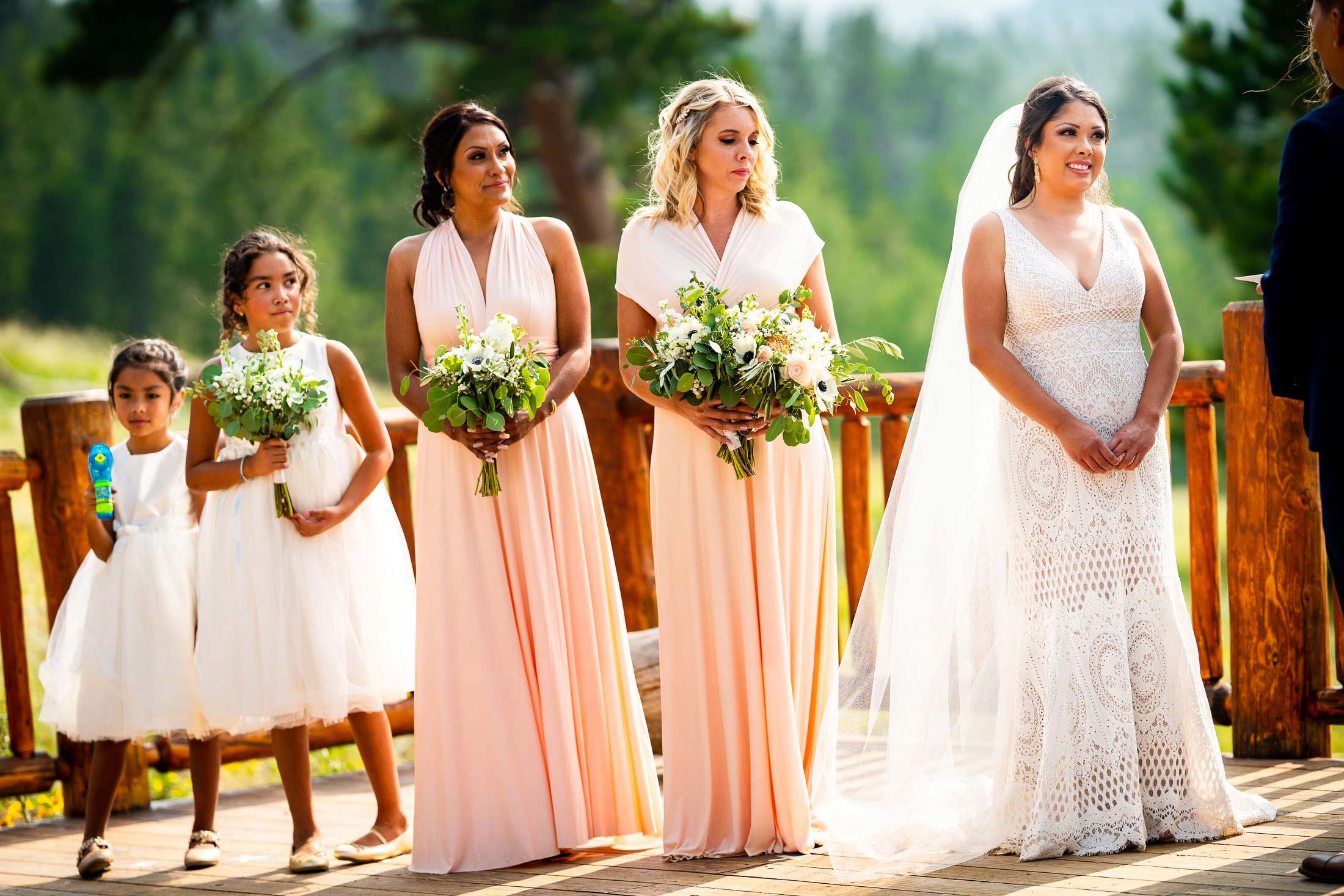 Bride stares into the eyes of his bride during their wedding ceremony in the mountains, wedding photos, wedding photography, wedding photographer, wedding inspiration, wedding photo inspiration, mountain wedding, YMCA of the Rockies wedding, YMCA of the Rockies wedding photos, YMCA of the Rockies wedding photography, YMCA of the Rockies wedding photographer, YMCA of the Rockies wedding inspiration, YMCA of the Rockies wedding venue, Estes Park wedding, Estes Park wedding photos, Estes Park wedding photography, Estes Park wedding photographer, Colorado wedding, Colorado wedding photos, Colorado wedding photography, Colorado wedding photographer, Colorado mountain wedding, Colorado wedding inspiration