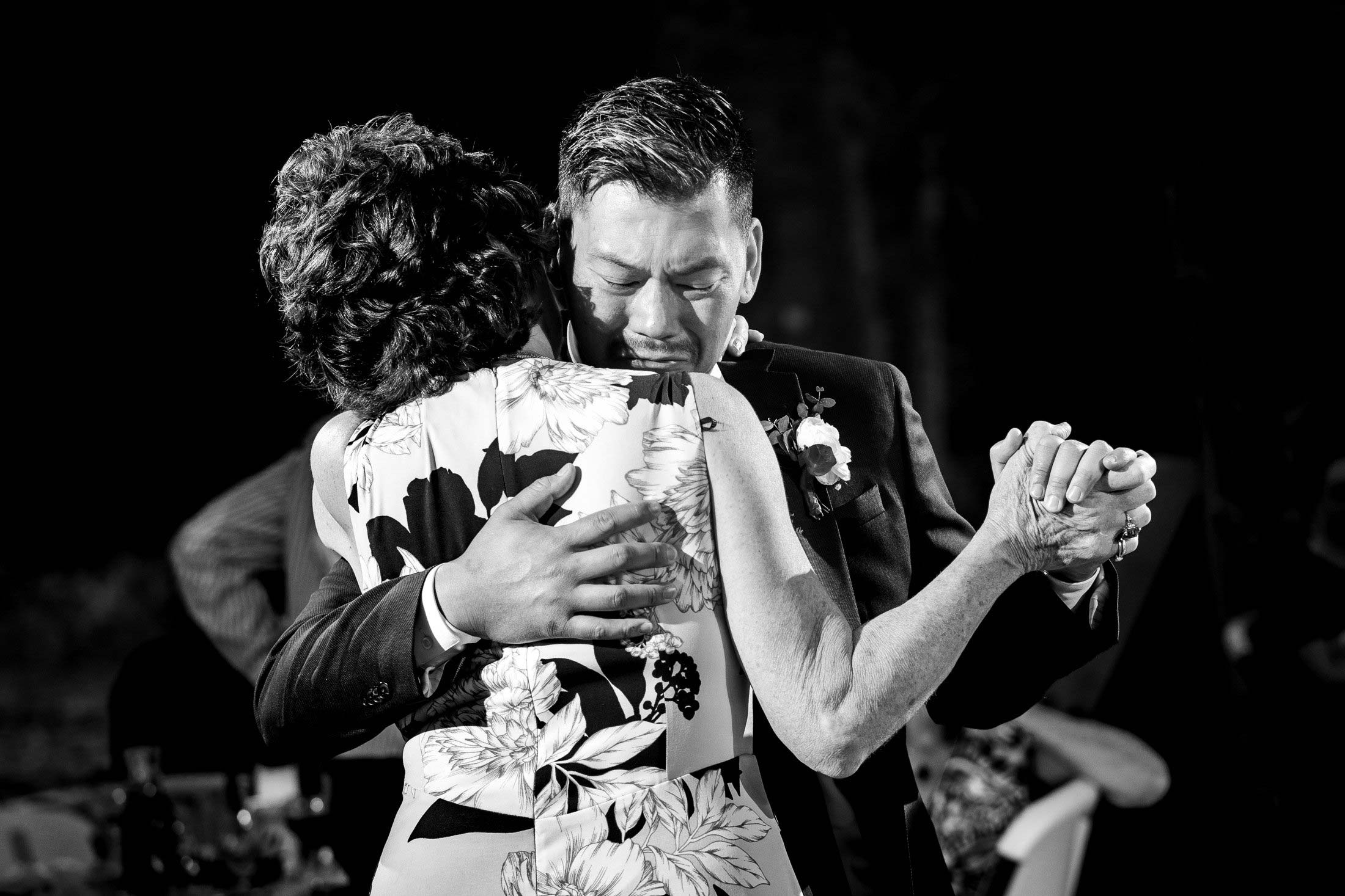 Groom  shares a first dance with his mother during the wedding reception, wedding photos, wedding photography, wedding photographer, wedding inspiration, wedding photo inspiration, mountain wedding, YMCA of the Rockies wedding, YMCA of the Rockies wedding photos, YMCA of the Rockies wedding photography, YMCA of the Rockies wedding photographer, YMCA of the Rockies wedding inspiration, YMCA of the Rockies wedding venue, Estes Park wedding, Estes Park wedding photos, Estes Park wedding photography, Estes Park wedding photographer, Colorado wedding, Colorado wedding photos, Colorado wedding photography, Colorado wedding photographer, Colorado mountain wedding, Colorado wedding inspiration