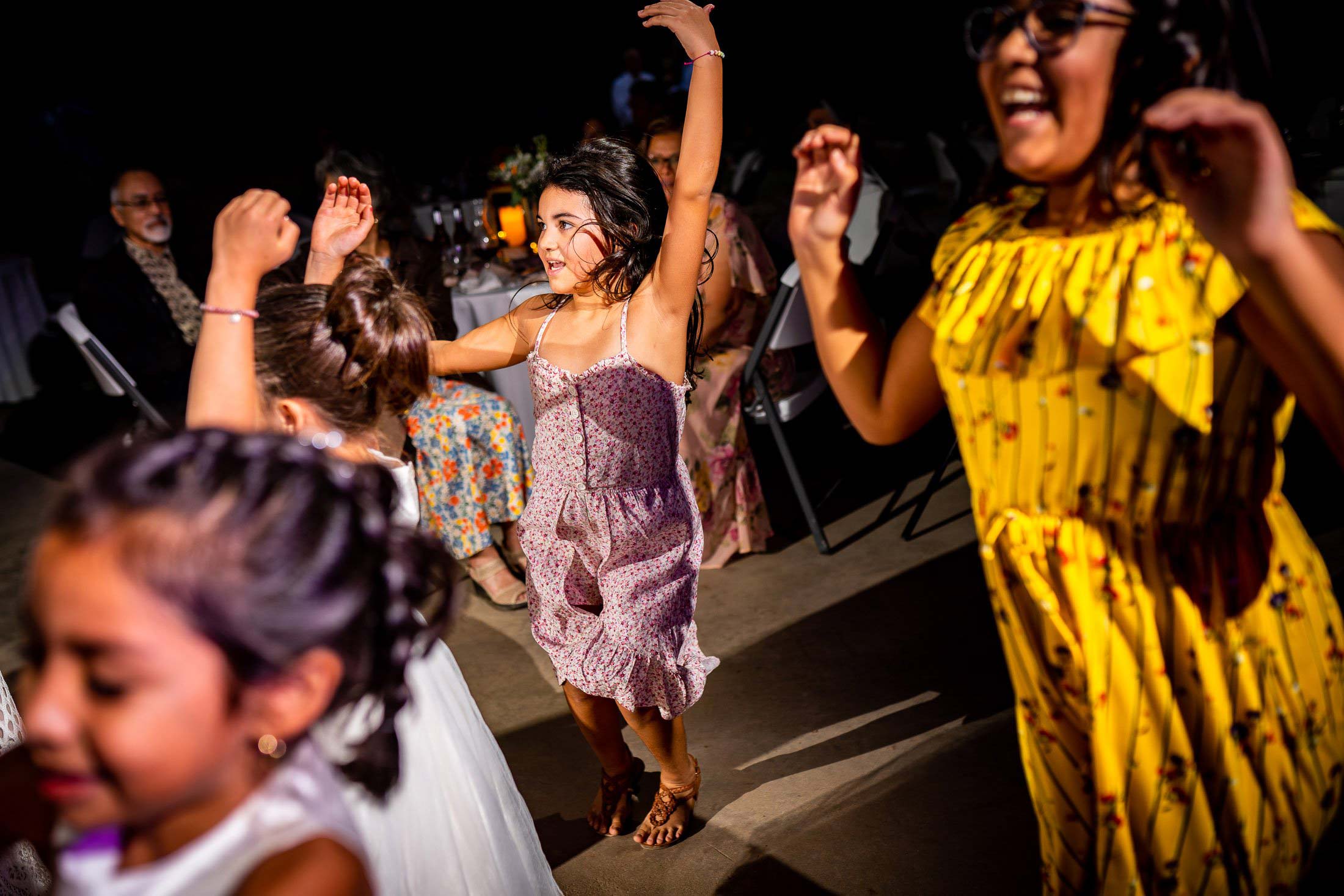 Guests dance to music in the hall during the wedding reception, wedding photos, wedding photography, wedding photographer, wedding inspiration, wedding photo inspiration, mountain wedding, YMCA of the Rockies wedding, YMCA of the Rockies wedding photos, YMCA of the Rockies wedding photography, YMCA of the Rockies wedding photographer, YMCA of the Rockies wedding inspiration, YMCA of the Rockies wedding venue, Estes Park wedding, Estes Park wedding photos, Estes Park wedding photography, Estes Park wedding photographer, Colorado wedding, Colorado wedding photos, Colorado wedding photography, Colorado wedding photographer, Colorado mountain wedding, Colorado wedding inspiration