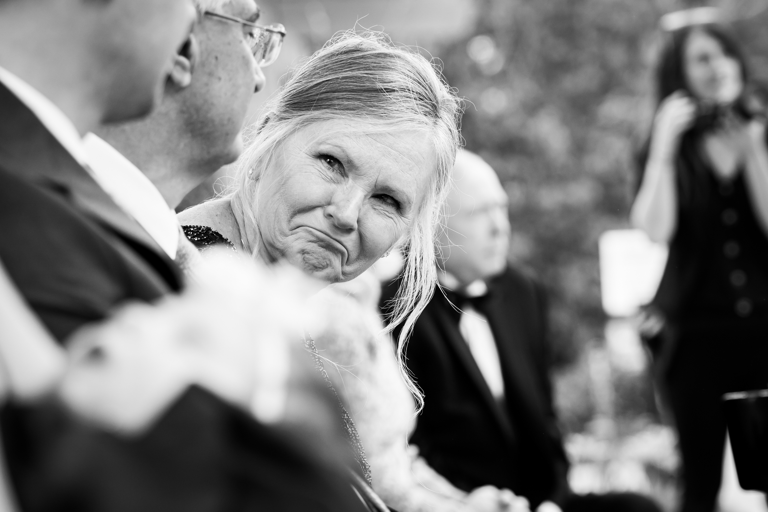 Mother of the groom reacts emotionally as the bride reads her vows aloud during their wedding ceremony, wedding photos, wedding photography, wedding photographer, wedding photo inspiration, Denver Botanic Garden wedding, Denver Botanic Garden wedding photos, Denver Botanic Garden wedding photography, Denver Botanic Garden wedding inspiration, Denver wedding venue, Denver wedding photos, Denver wedding photography, Denver wedding photographer, Colorado wedding photography