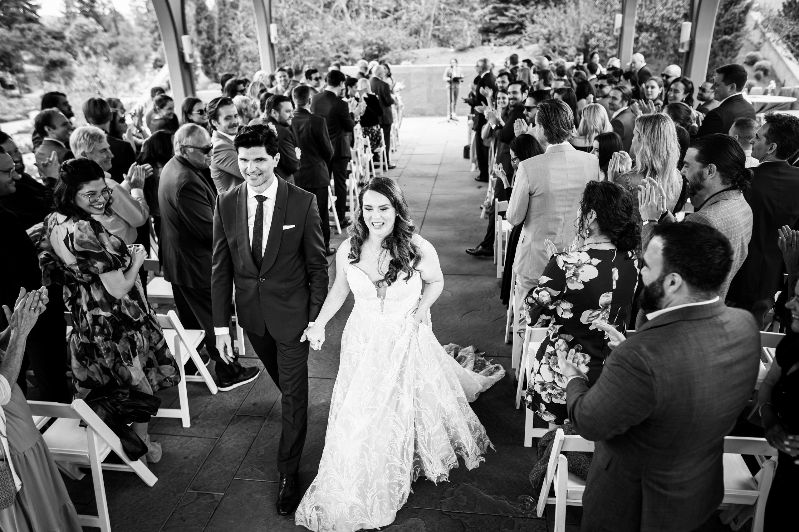 Bride and groom walk down the aisle as newlyweds during their wedding ceremony, wedding photos, wedding photography, wedding photographer, wedding photo inspiration, Denver Botanic Garden wedding, Denver Botanic Garden wedding photos, Denver Botanic Garden wedding photography, Denver Botanic Garden wedding inspiration, Denver wedding venue, Denver wedding photos, Denver wedding photography, Denver wedding photographer, Colorado wedding photography