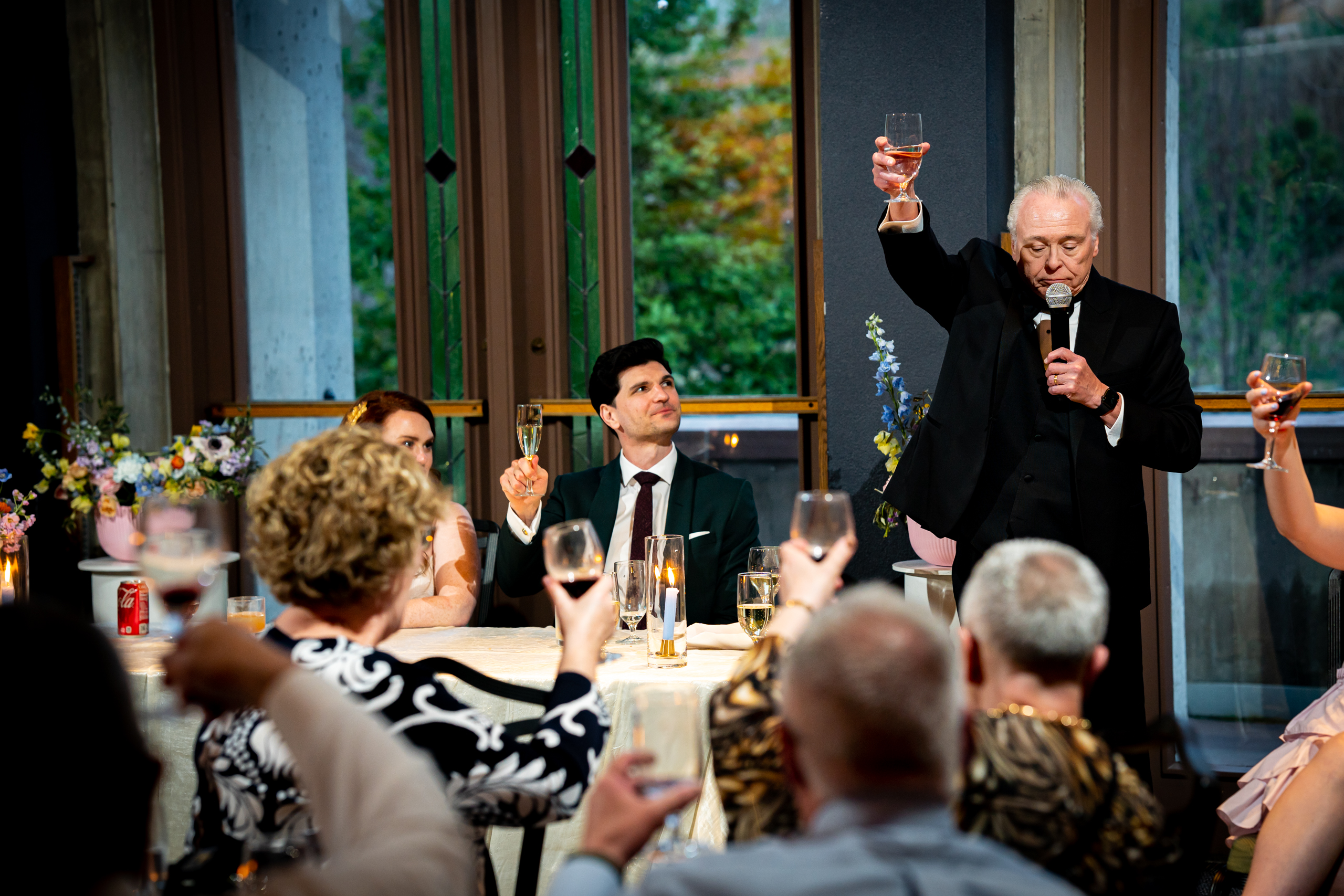 Father of the bride toasts to the bride and groom in his speech during the wedding reception, wedding photos, wedding photography, wedding photographer, wedding photo inspiration, Denver Botanic Garden wedding, Denver Botanic Garden wedding photos, Denver Botanic Garden wedding photography, Denver Botanic Garden wedding inspiration, Denver wedding venue, Denver wedding photos, Denver wedding photography, Denver wedding photographer, Colorado wedding photography
