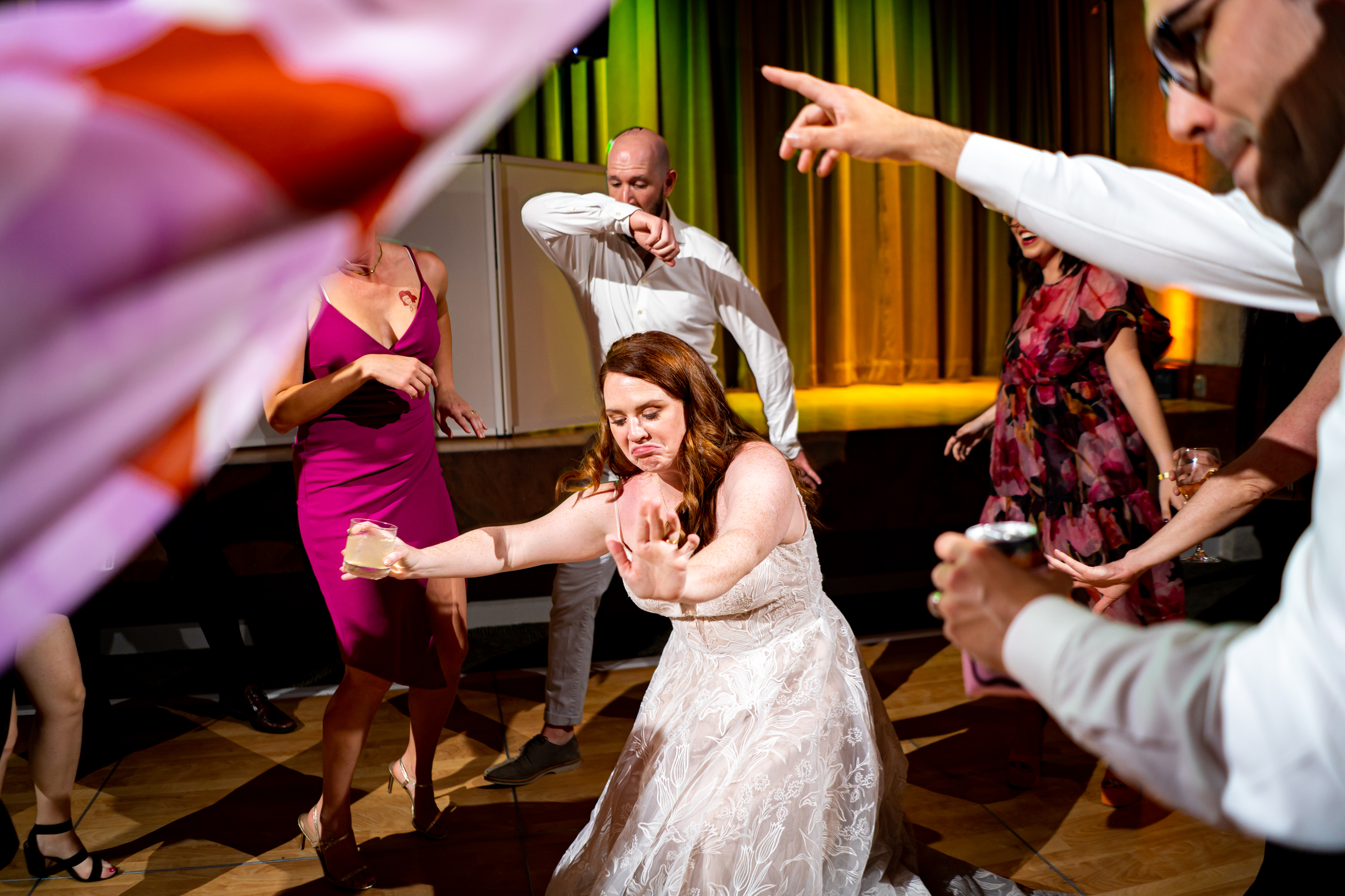 Guests dance to music on a colorful dance floor during the wedding reception, wedding photos, wedding photography, wedding photographer, wedding photo inspiration, Denver Botanic Garden wedding, Denver Botanic Garden wedding photos, Denver Botanic Garden wedding photography, Denver Botanic Garden wedding inspiration, Denver wedding venue, Denver wedding photos, Denver wedding photography, Denver wedding photographer, Colorado wedding photography