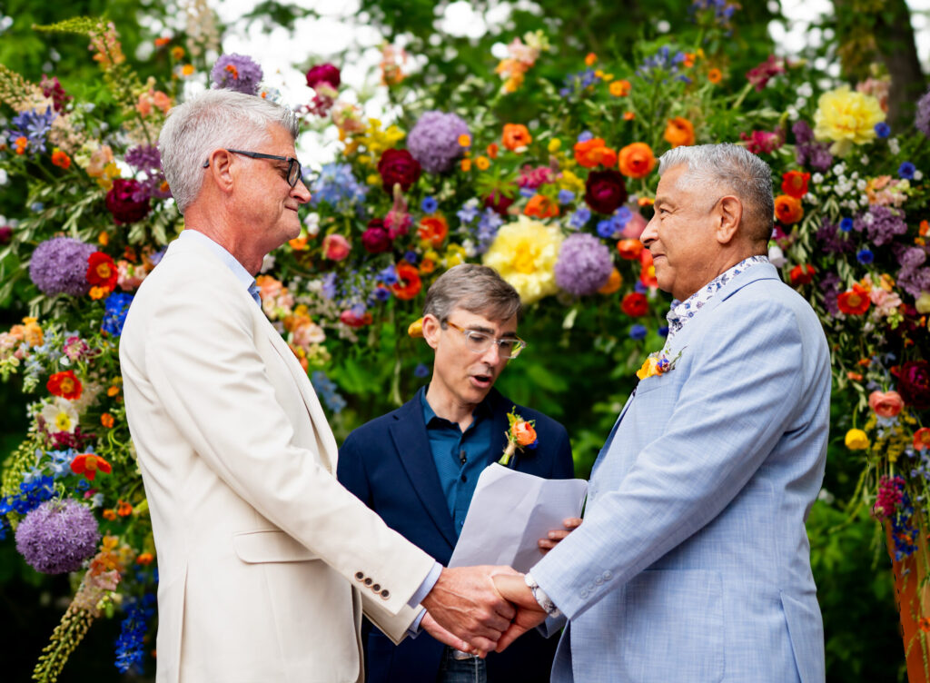 Two grooms celebrate their wedding with their closest family and friends at The Lyons Farmette in Lyons, CO