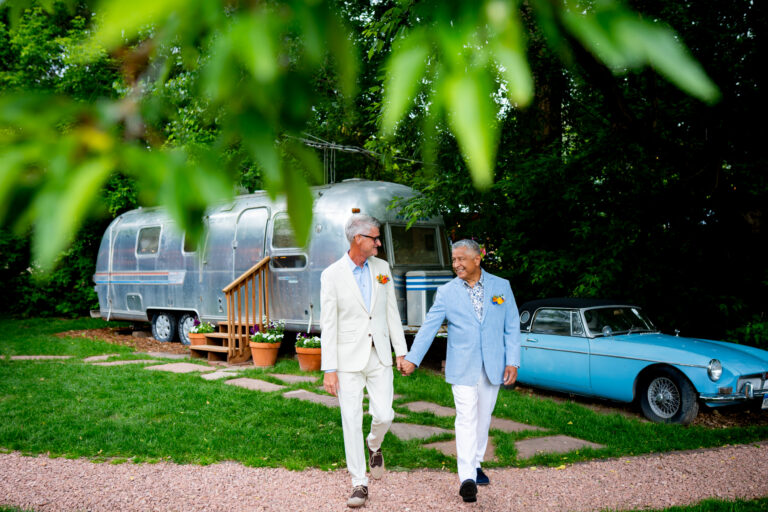 Two grooms celebrate their wedding with their closest family and friends at The Lyons Farmette in Lyons, CO