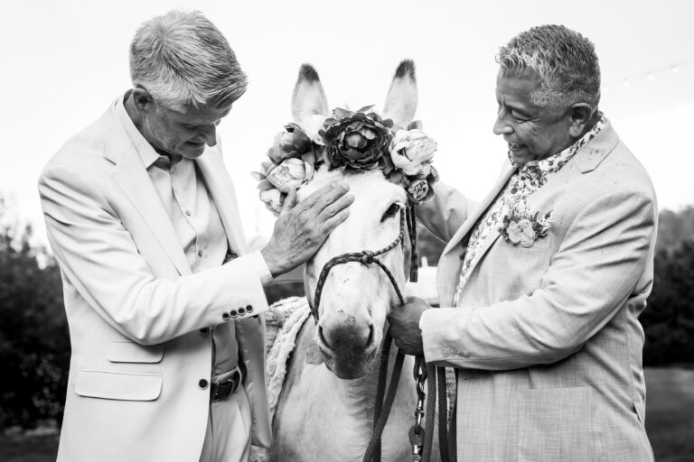 Two grooms celebrate their wedding with their closest family and friends at The Lyons Farmette in Lyons, CO